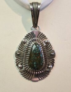 Sterling silver and Kingman Ceremonial turquoise pendant by Alton Bedonie 